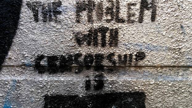 Graffiti on wall: "The problem with censorship is XXXXXXX"